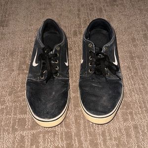 Black Nike sneakers